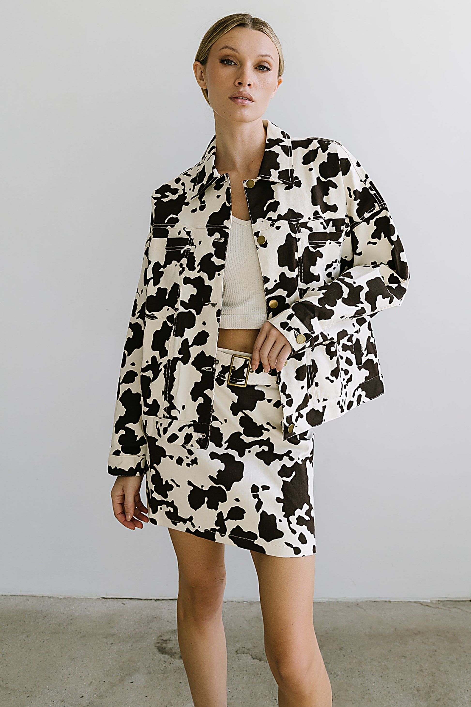 Tasha Cow Print Mini Skirt