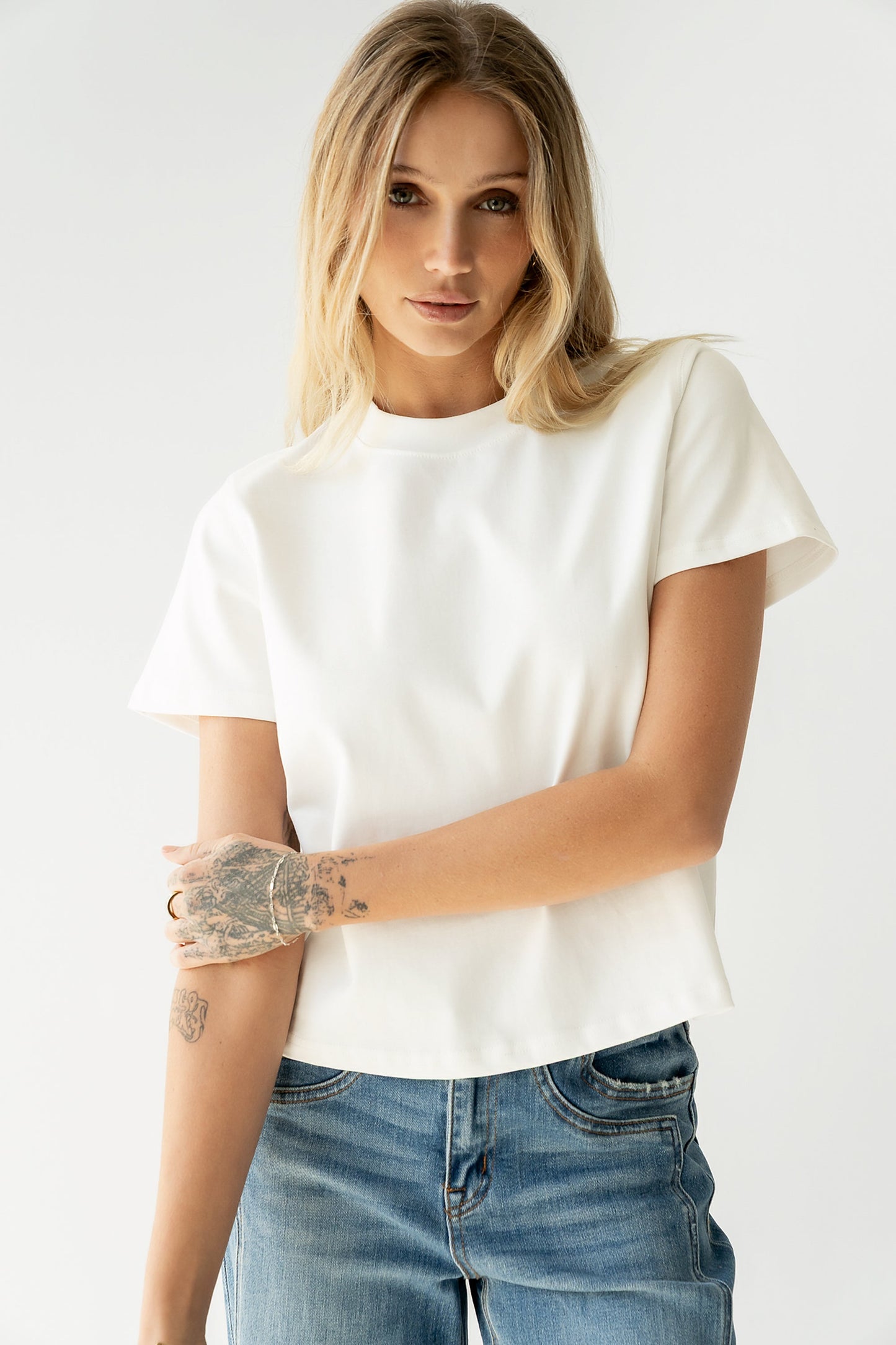 Judy Tee in White