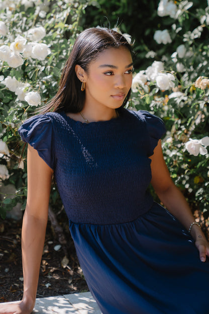 Harshell Smocked Midi Dress
