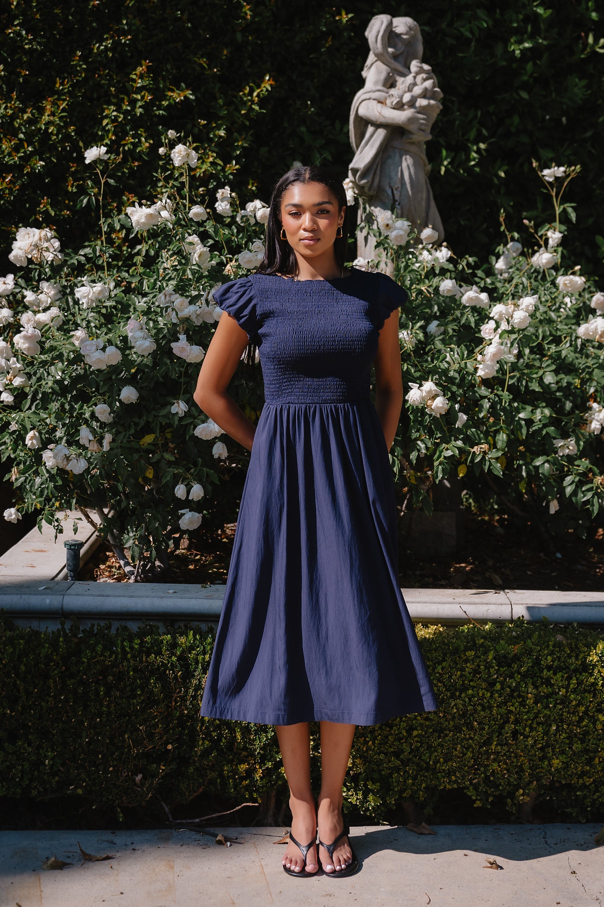 Harshell Smocked Midi Dress